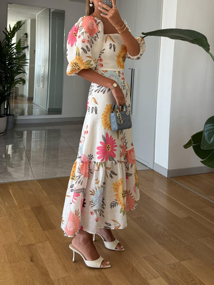 Sara - Midi Pofmouw jurk met bloemenprint