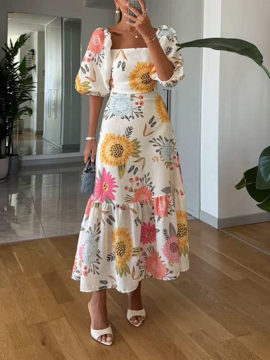 Sara - Midi Pofmouw jurk met bloemenprint