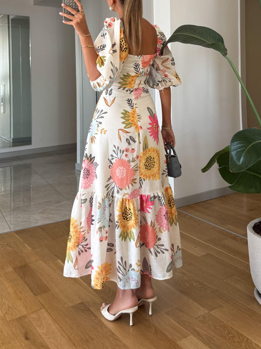 Sara - Midi Pofmouw jurk met bloemenprint